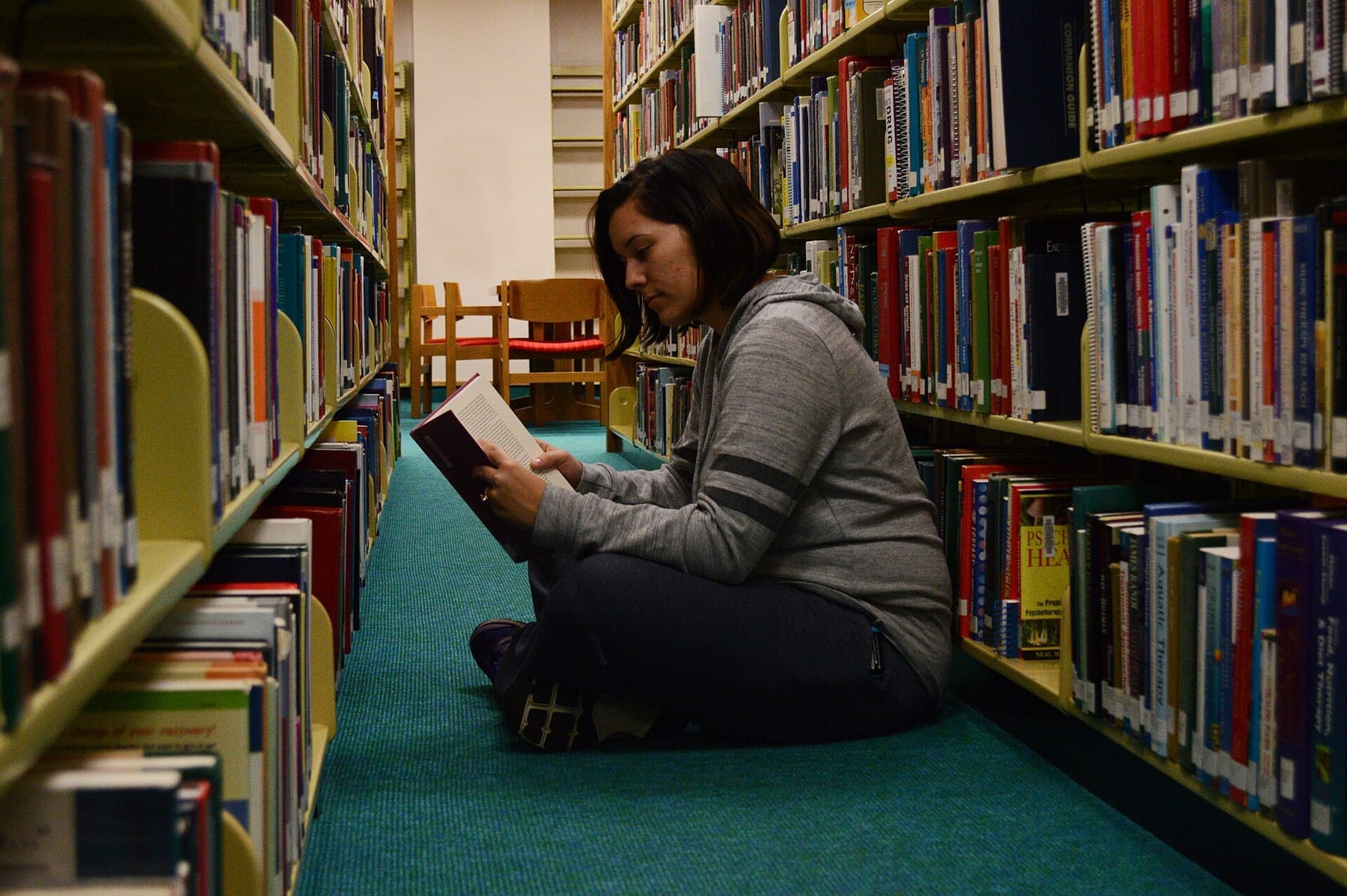 Student in Library Pittsburg State University (photograph from the Wikimedia Commons category Pittsburg State University)