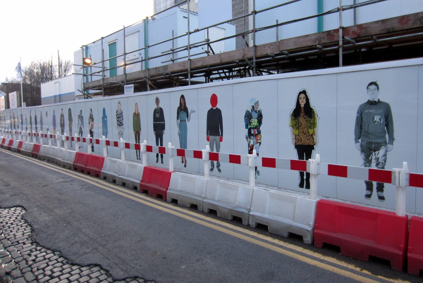 Decorated building site by the College of Music - geograph.org.uk - 2844625 (photograph from the Wikimedia Commons category Royal Northern College of Music)