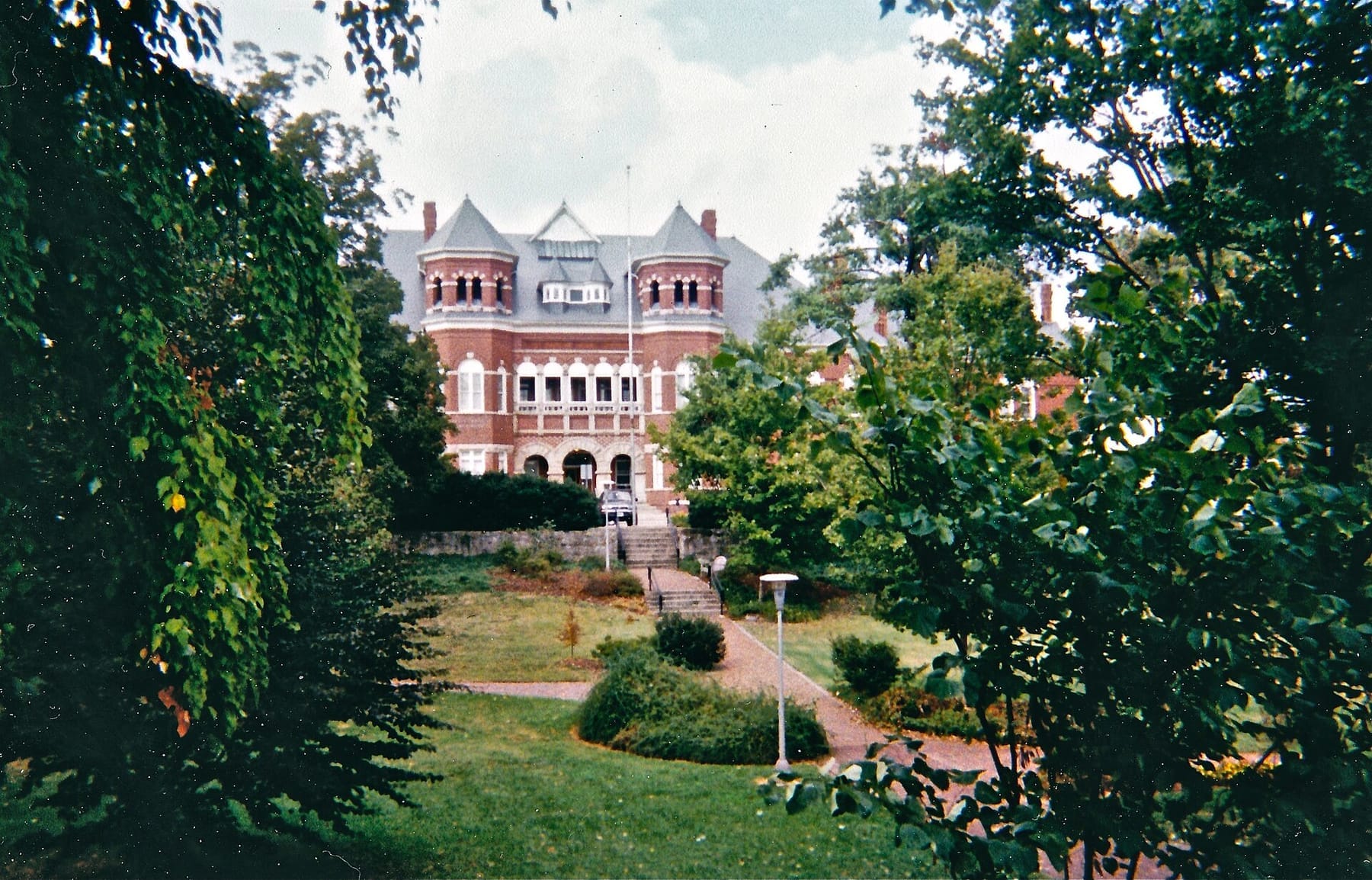 UNCG's first building 1892 - panoramio (photograph from the Wikimedia Commons category University of North Carolina at Greensboro)