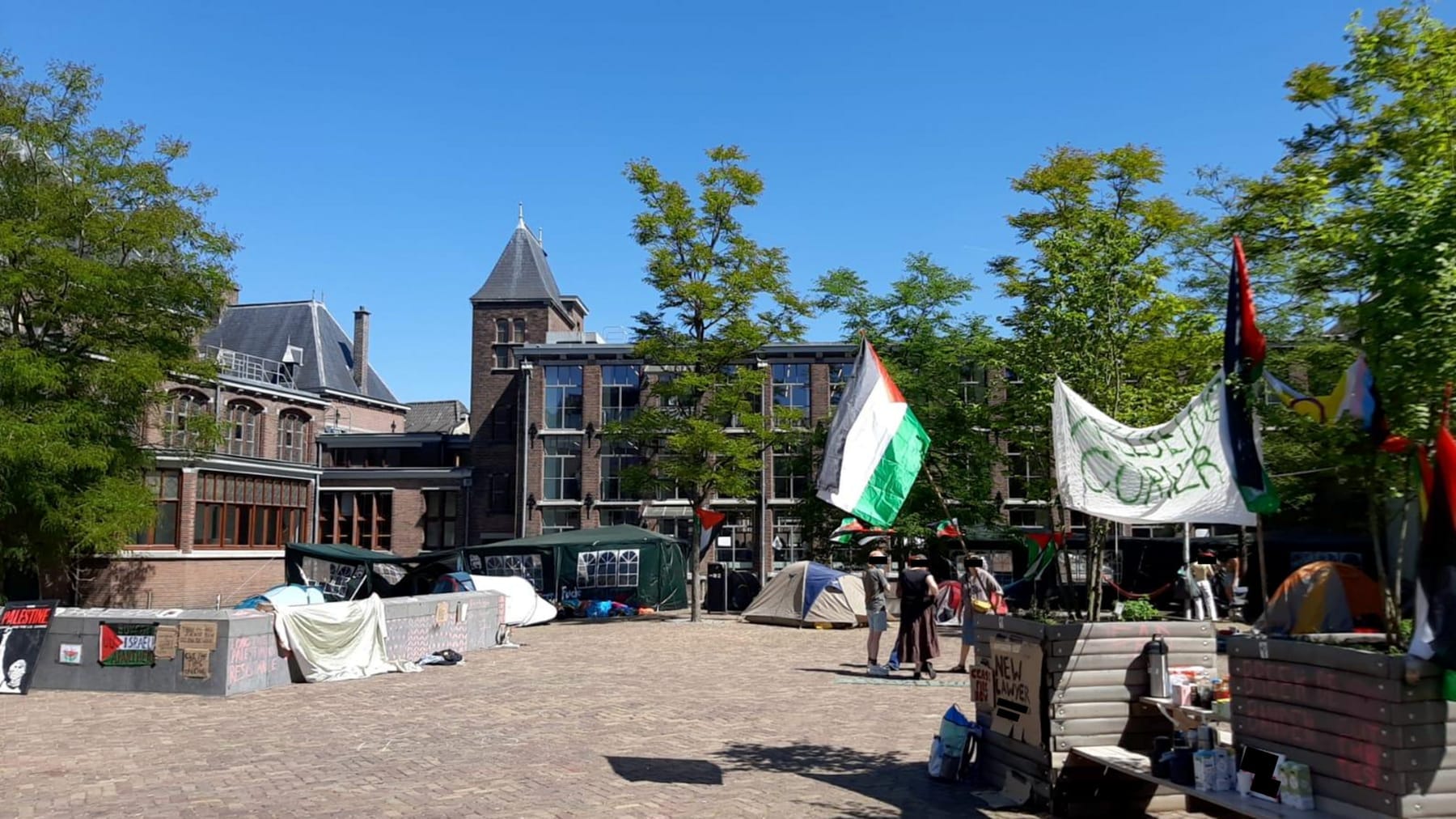 UU library courtyard encampment well-being corner May 2025 (photograph from the Wikimedia Commons category Universiteit Utrecht)